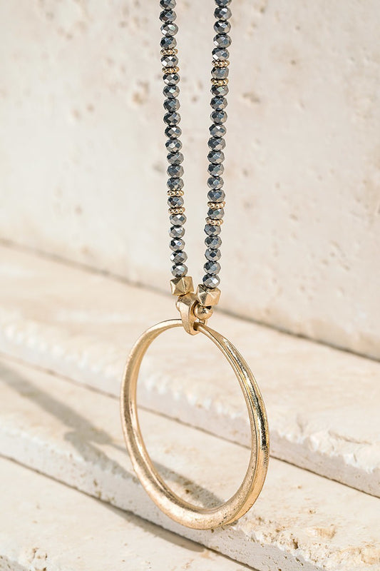 Gold plated Ring Pandant with Shimmery Glass Pendant