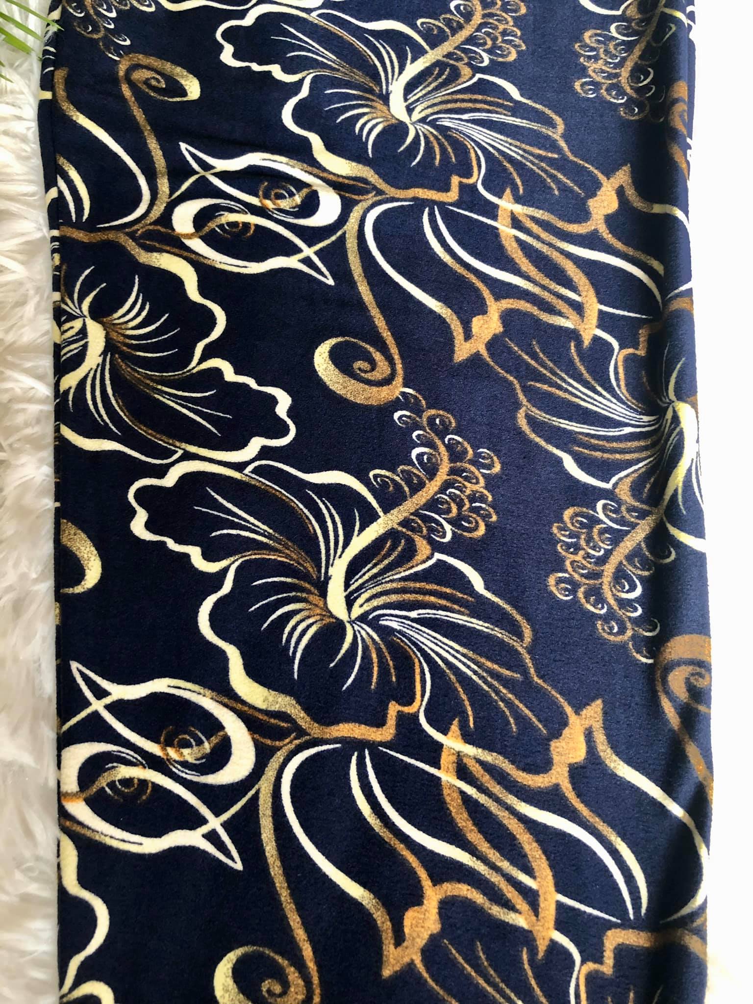 regular size capris hibiscus pattern made of buttery soft polyester material spandex